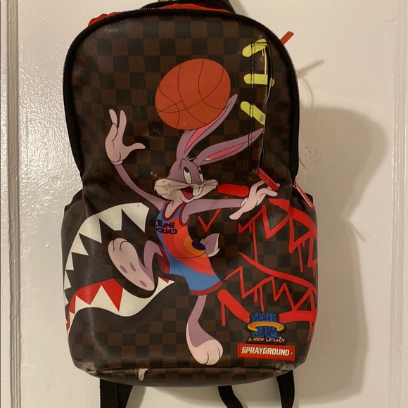 Sprayground Brown Checkered Backpack with Cartoon Design